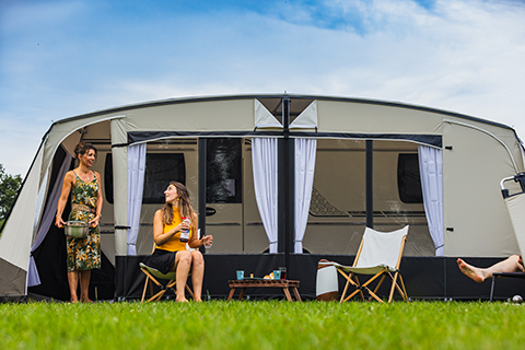 REDA Lucca with woman in front of tent