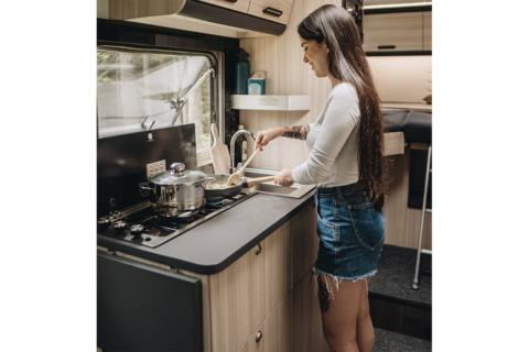 cooking area with young woman in Sun Living on Ford