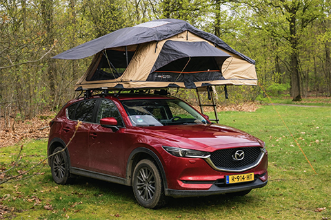 DTBD Sitta 180 rooftop tent on red toyota car in the forest